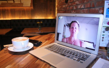 laptop showing skype communication
