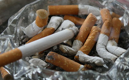 cigarettes in a glass ashtray